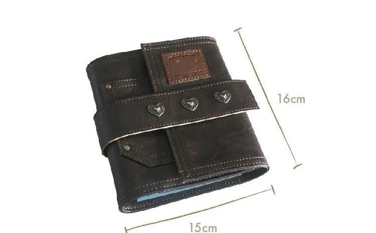Brown retro-style A7 notebook with a leather buckle design and loose-leaf binding