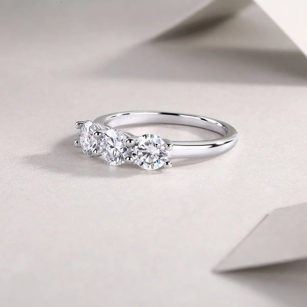 0.5 carat moissanite wedding ring set in S925 silver with platinum plating, gold colour, on white background