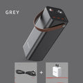 Black portable power bank with 20000mAh capacity, 220V output, and solar panel input for outdoor charging.