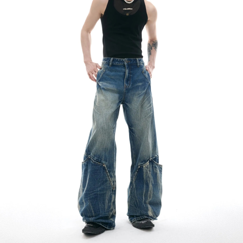 Men's verdant blue jeans with retro washed burst pattern and curved knife style loose fit design