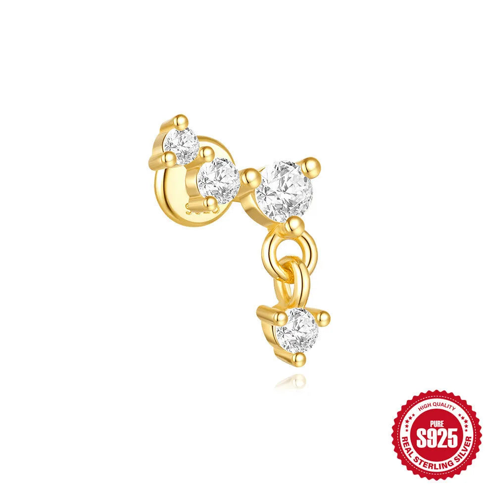 Geometric moon and star earrings in S925 sterling silver with embedded diamonds and a gold colour finish.