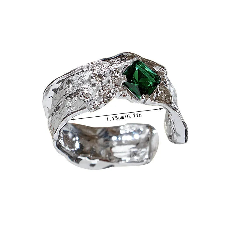 Irregular zircon ring with geometric copper base, adjustable open mouth, white golden-becarite colour