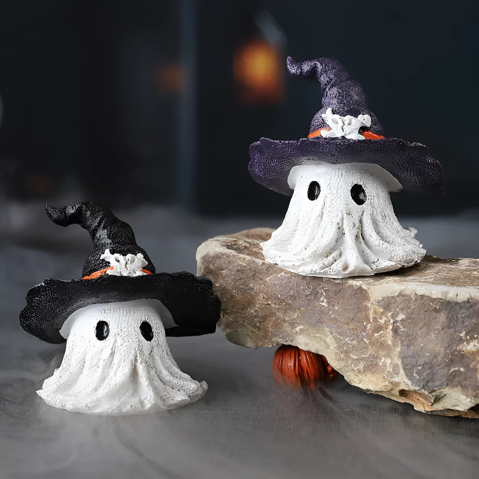 Resin wizard hat Halloween ornament in purple and black colour options.