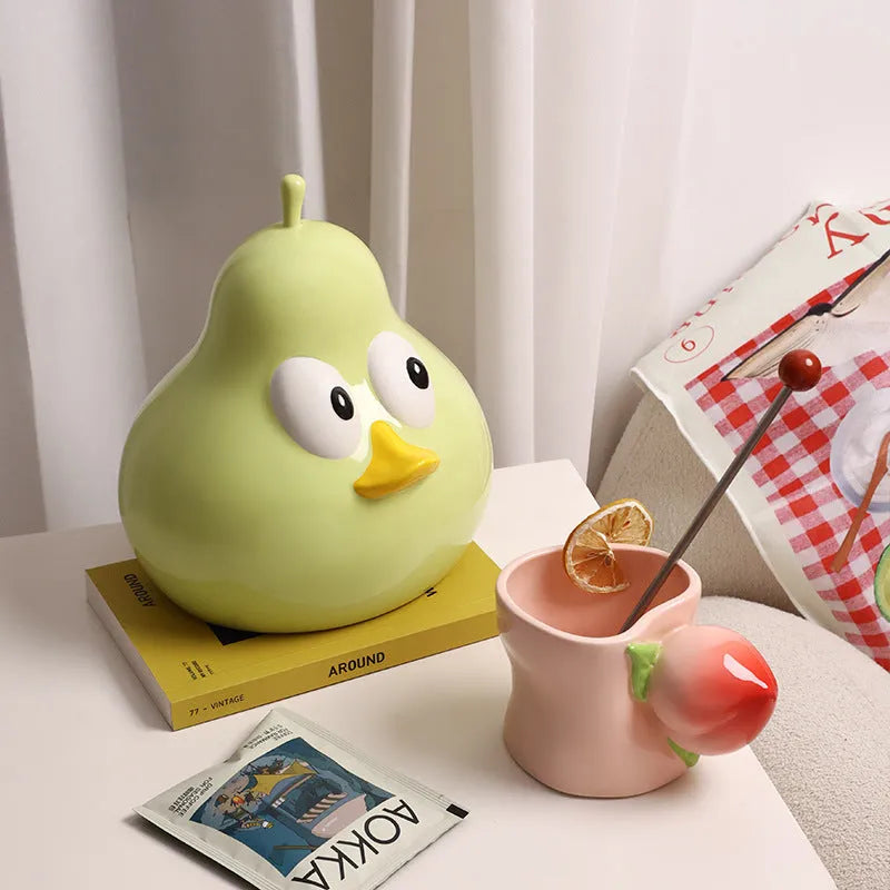 White ceramic pear-shaped tissue box holder in cute design with green colour option