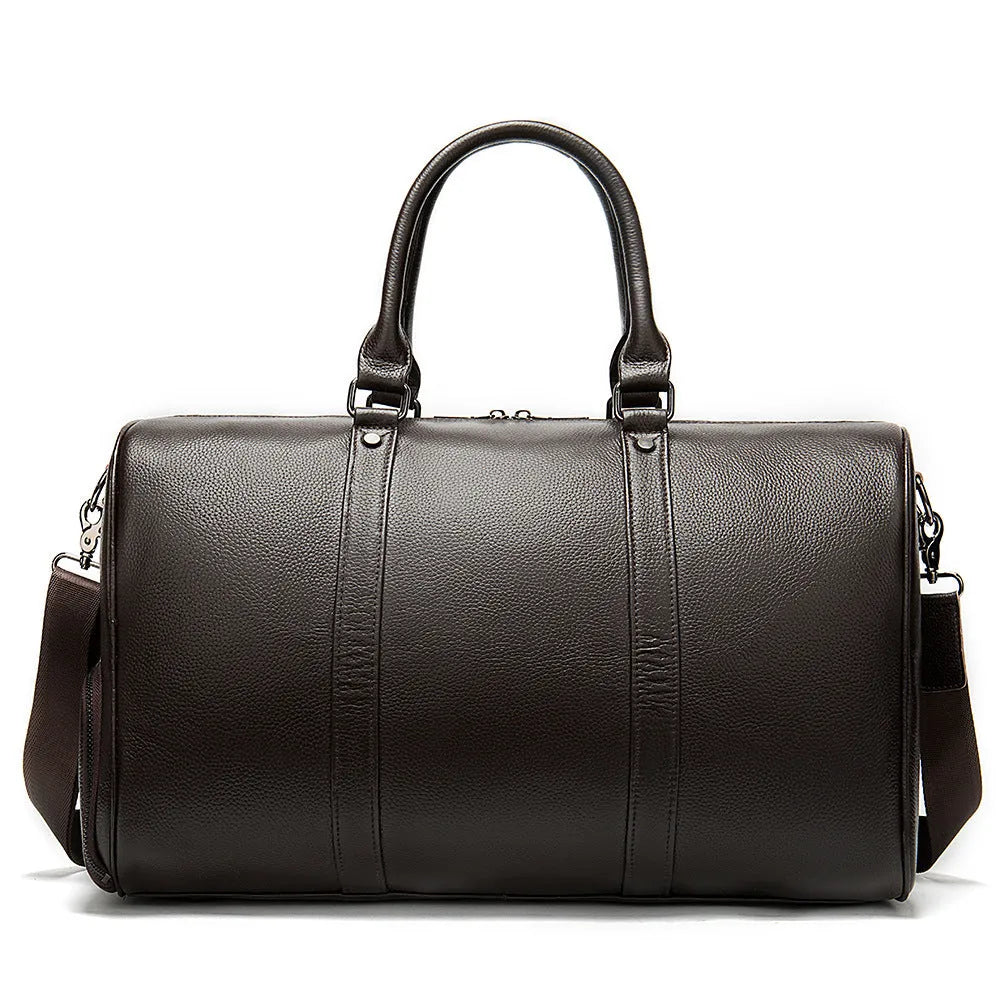 Men's black leather excursion tote bag with single shoulder strap showing substantial capacity