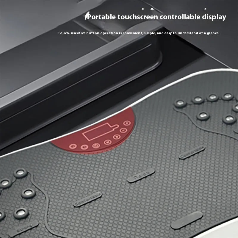 Black and pink vibration plate fitness machine with wireless remote control on a home floor.
