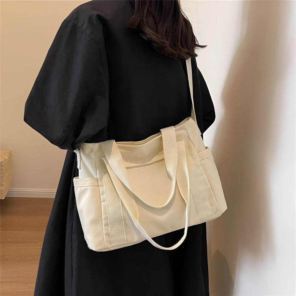 Large capacity polyester shoulder tote bag for women in solid colours with mobile phone pocket