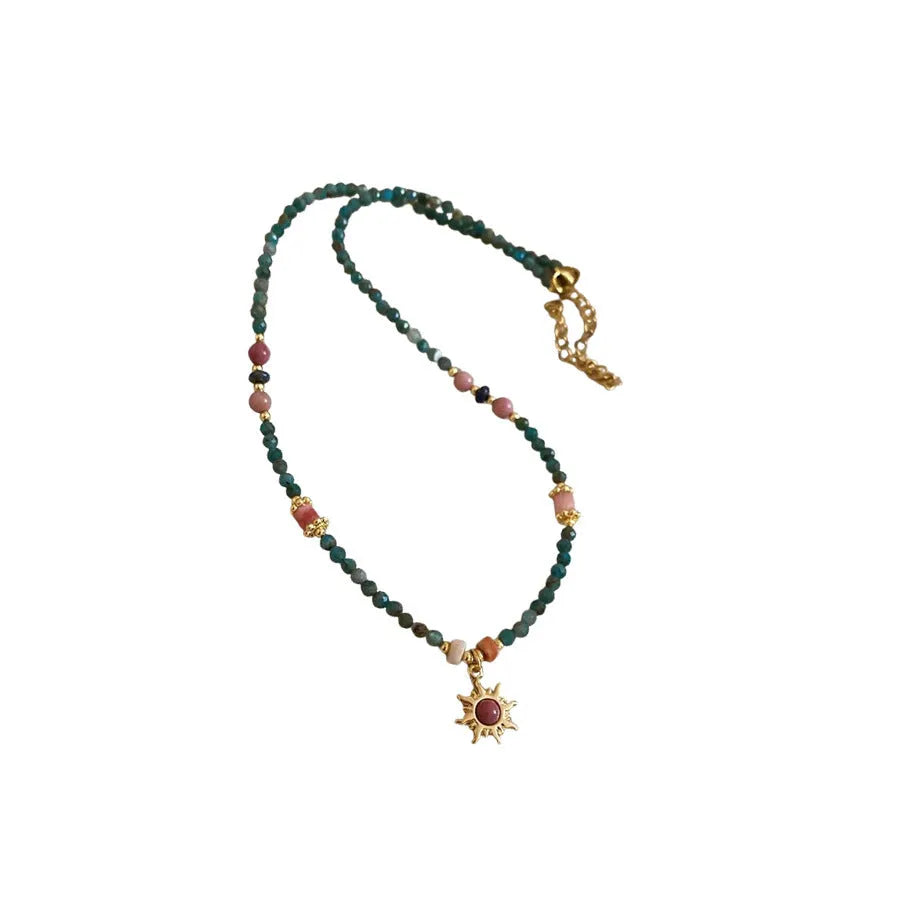 Freshwater pearl necklace with stone sun pendant, French court style, blue and golden-blue-pink colours