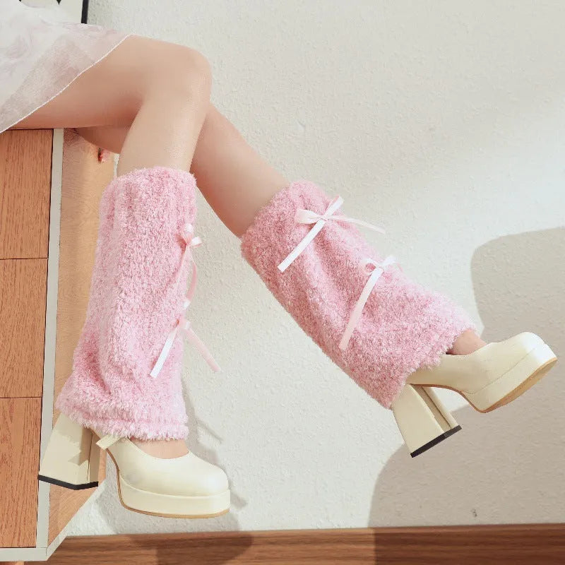 Plush leg warmer in solid colour with decorative bow, autumn winter design for women