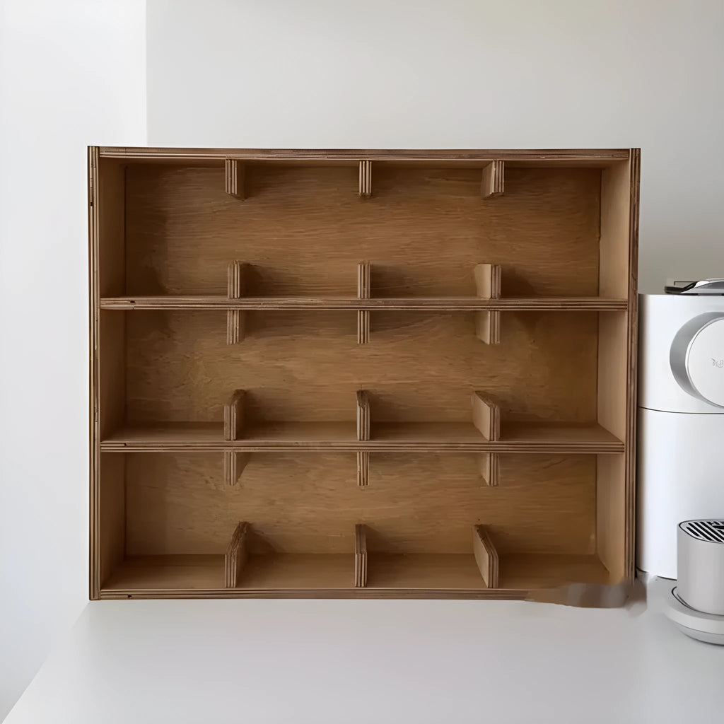 Square solid wood storage rack with multiple grid compartments for cups and mugs in a birch wood finish.
