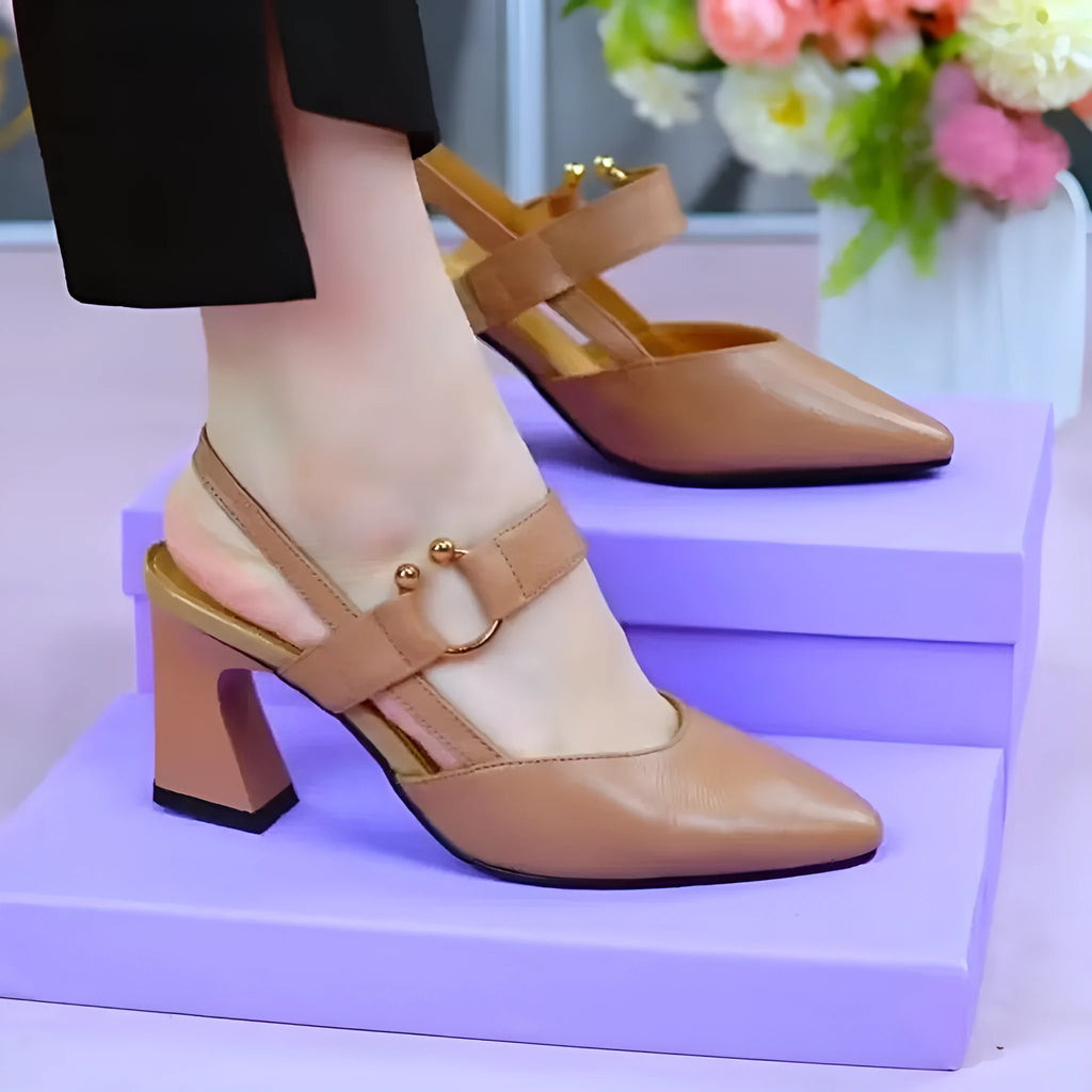 Women's black closed toe high heel sandals with a chunky rubber sole and pigskin leather upper.