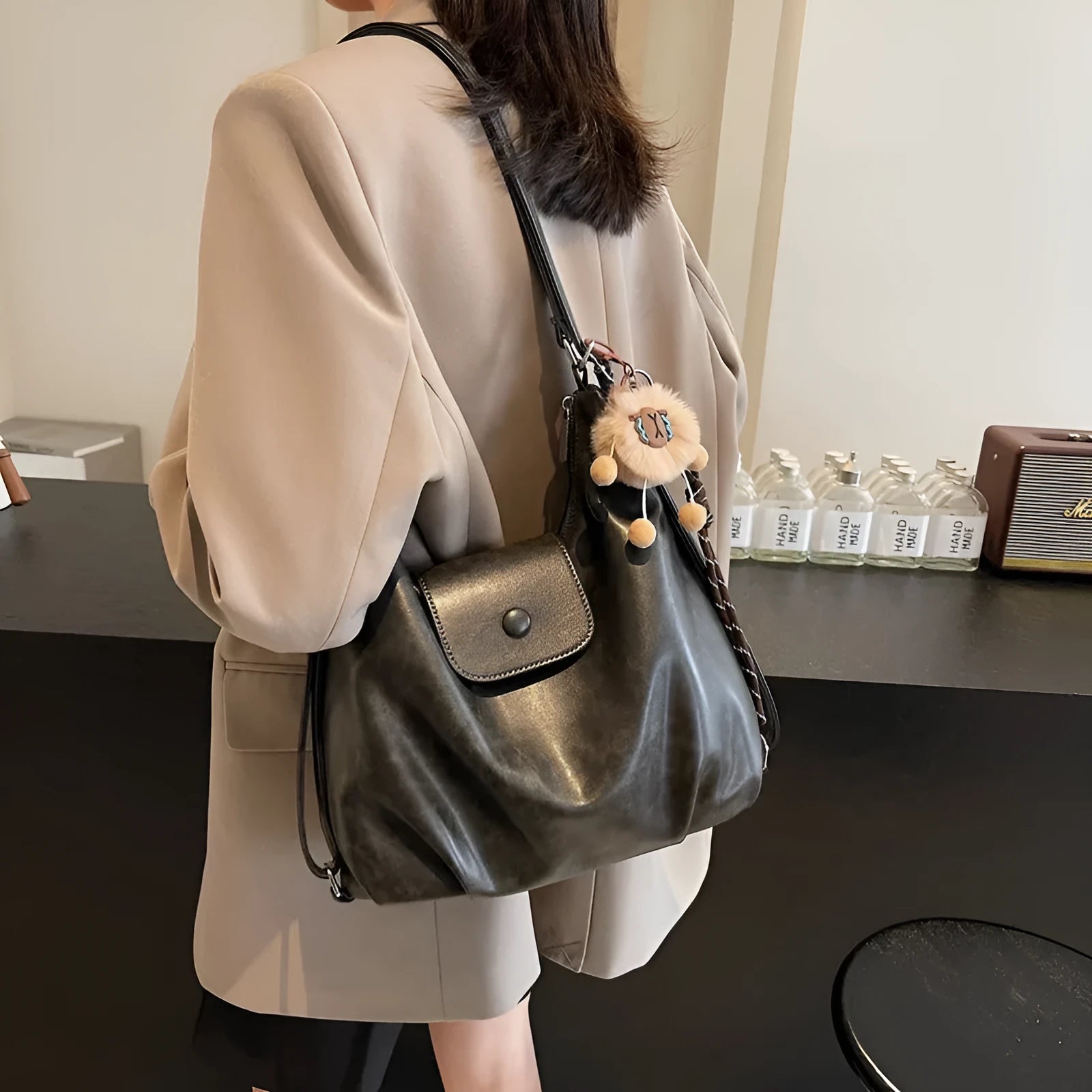 Women's black PU leather horizontal square shoulder bag with single strap and mobile phone compartment