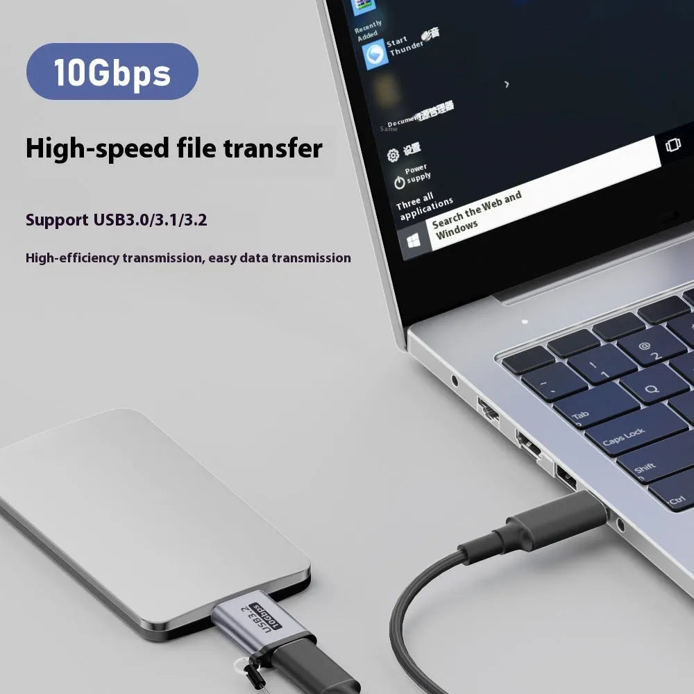 USB AM to Micro-B adapter for connecting old hard drives and phones.