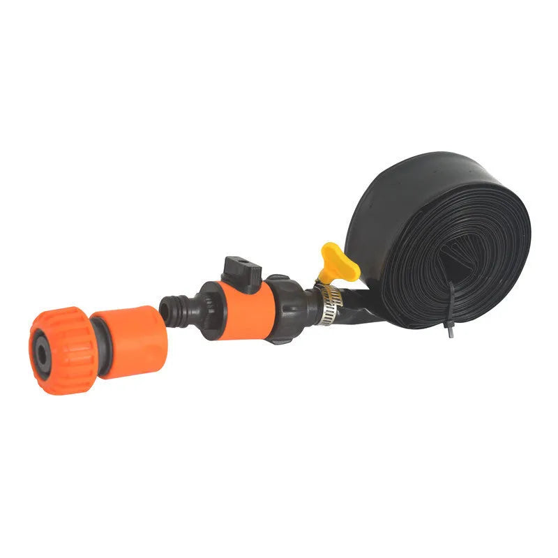 Blue portable plastic garden sprinkler with solar panel on green grass.