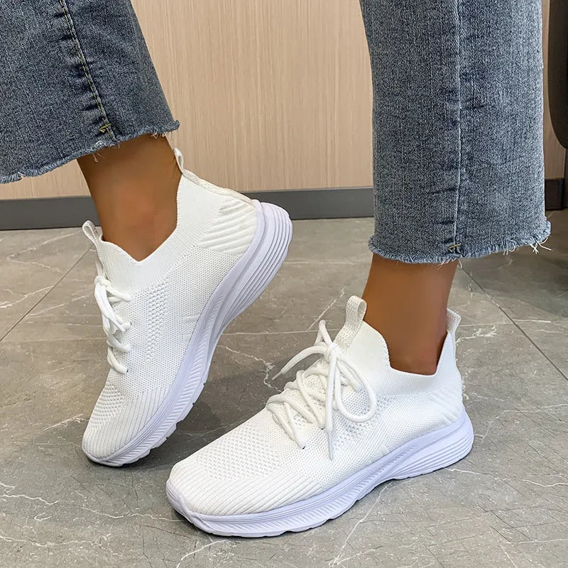 Women's breathable mesh running shoes in three colour options with flyknit upper and rubber sole