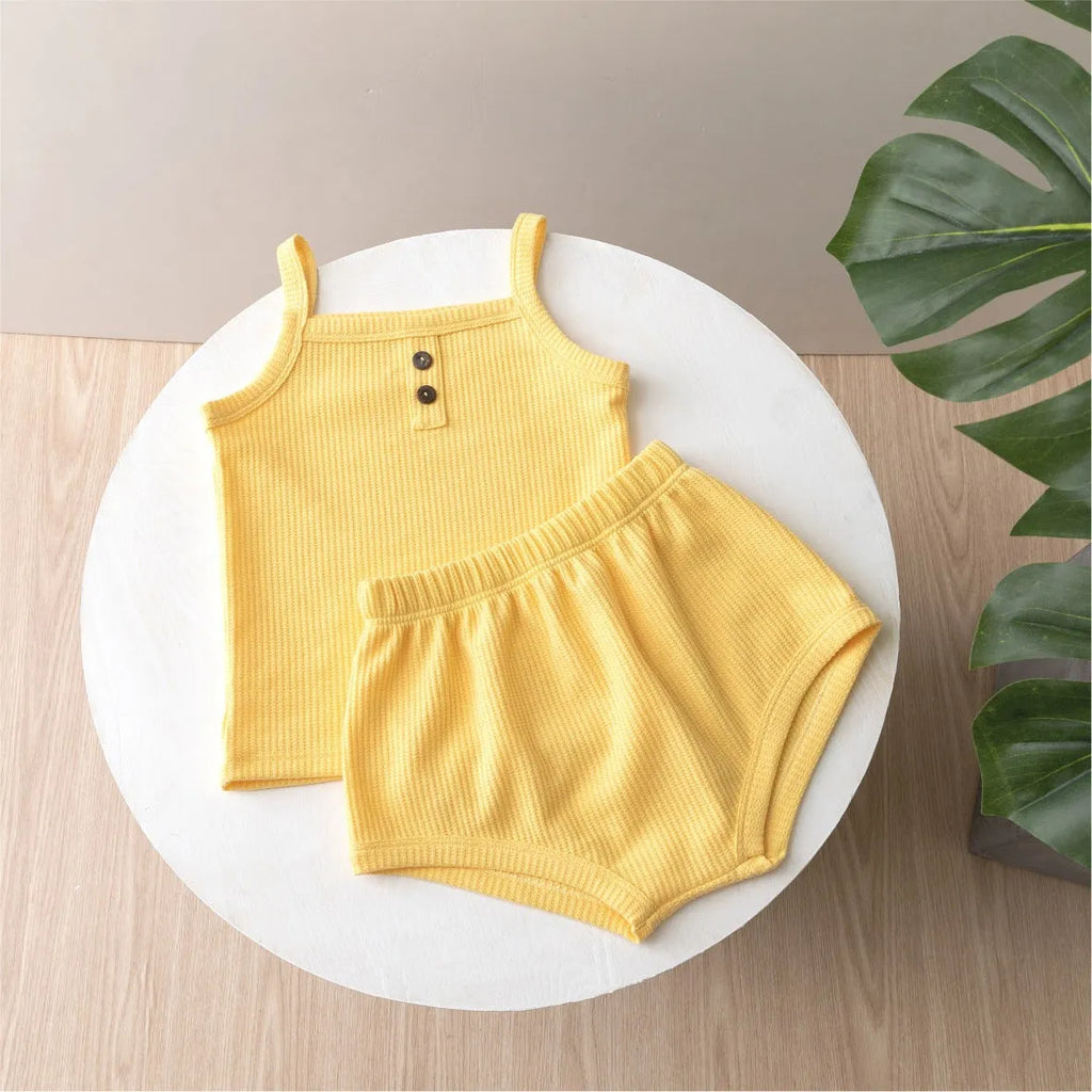 Summer baby camisole set with short sleeves and matching shorts in light yellow cotton fabric
