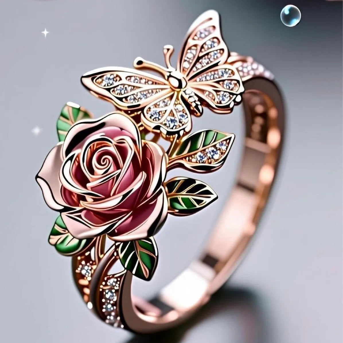 Adjustable butterfly personality ring with colourful oil treatment showing flower, insect and leaf elements