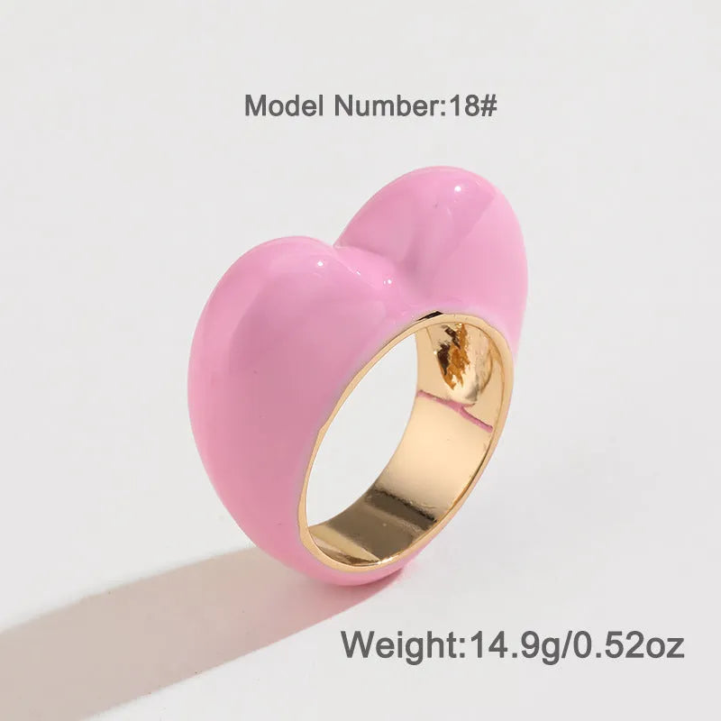 Heart-shaped zinc alloy ring with raised three-dimensional enamel colour design in love theme.