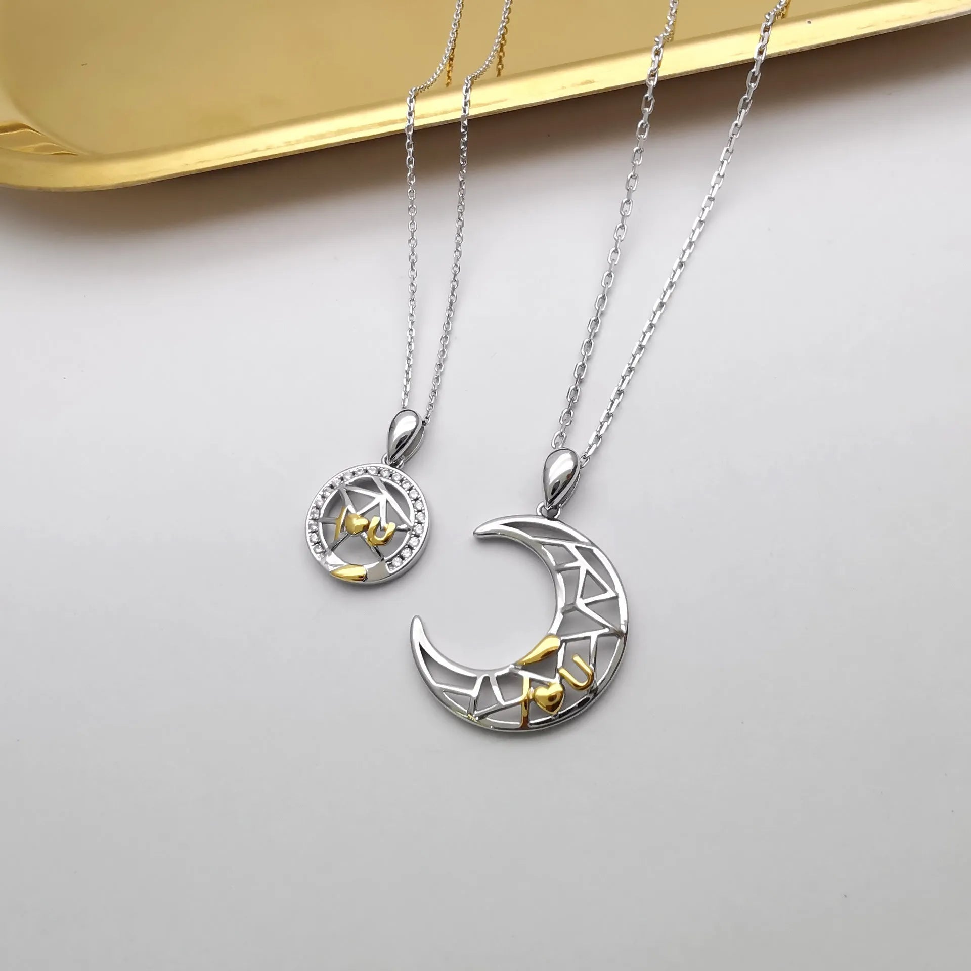 Copper sun and moon couple necklace with electroplated finish on cross chain