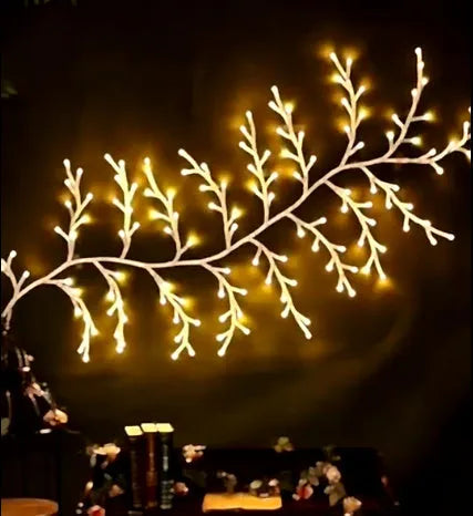 Flexible LED willow vine garland with 144 warm white lights and birch bark texture for wall decoration