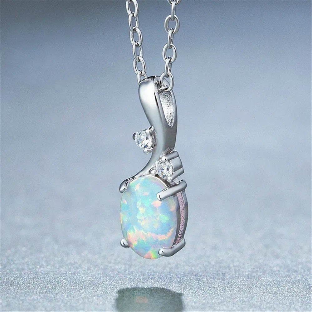 Water drop opal pendant on an adjustable alloy chain necklace in rose gold colour