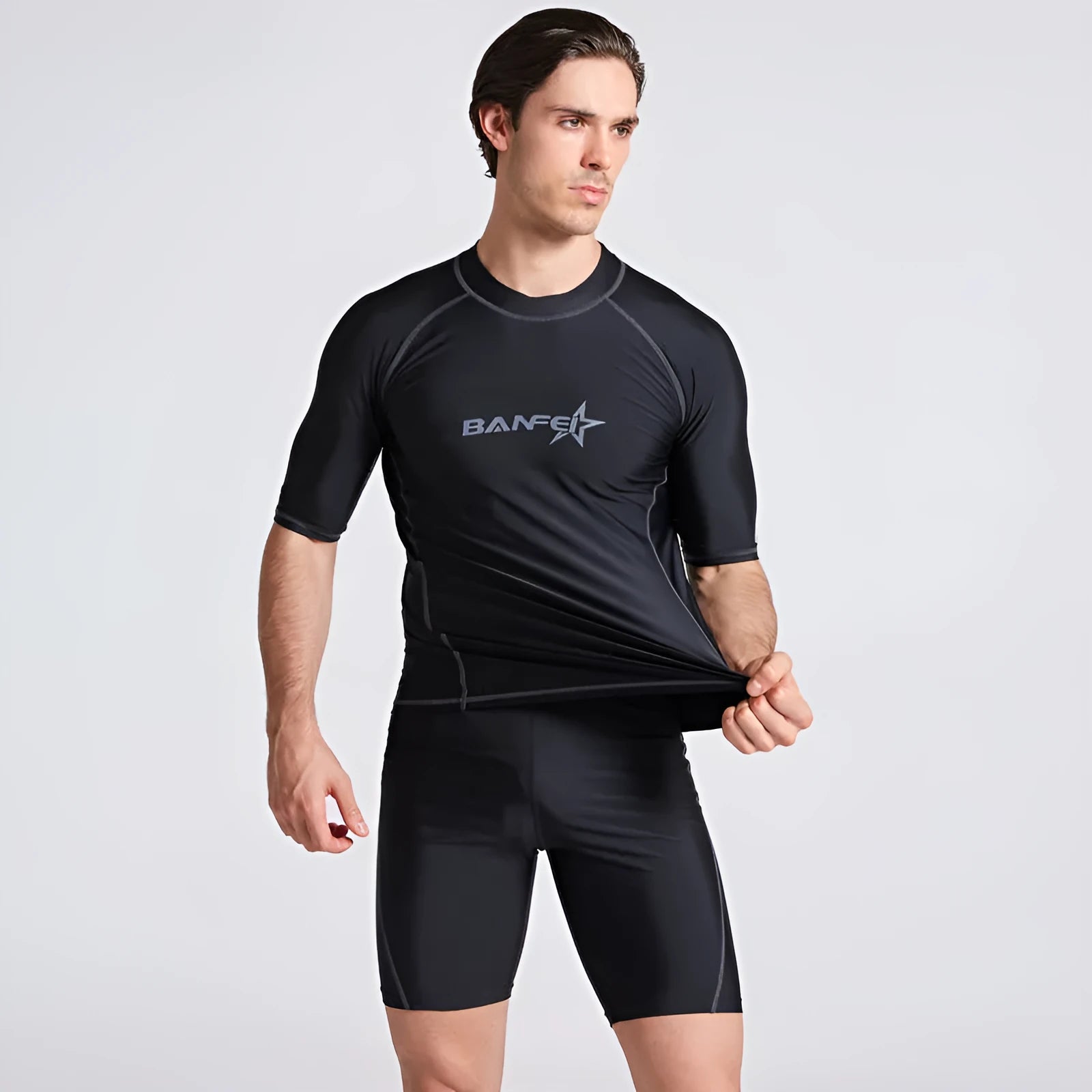 Men's blue quick-drying nylon swim set with half-sleeve top and matching swim pants on a mannequin.