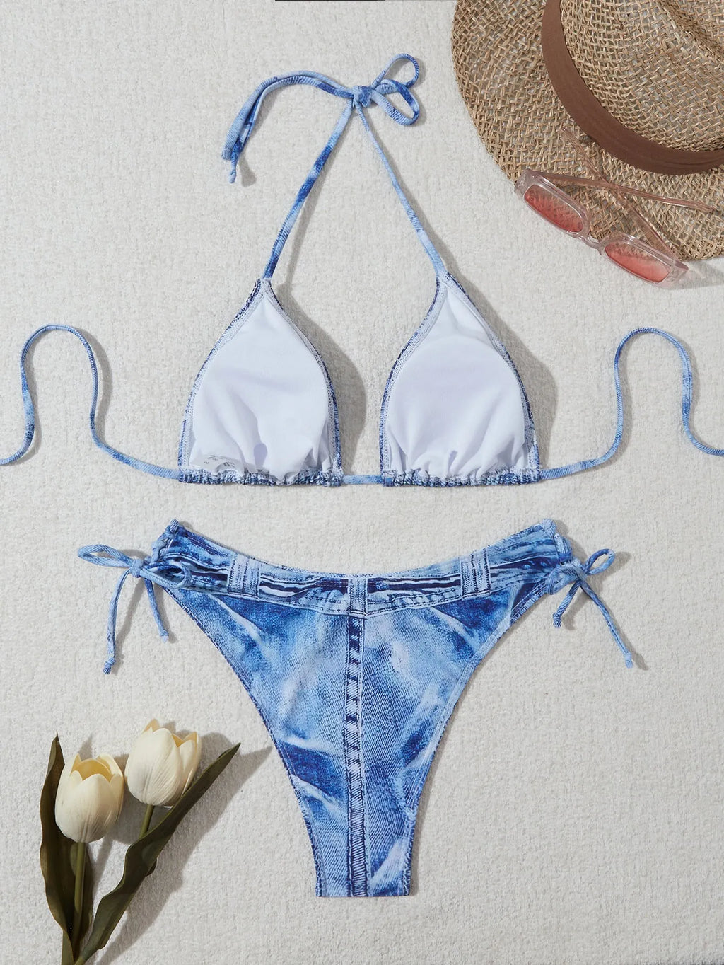 Women's denim blue printed strappy bikini set showing front view of two-piece swimwear