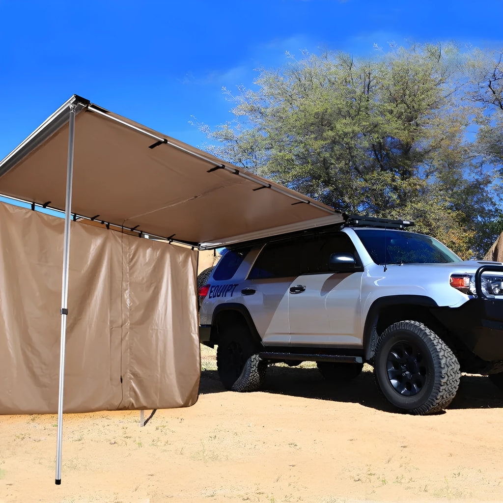 Camouflage two-bedroom camping tent with aluminium poles set up outdoors.