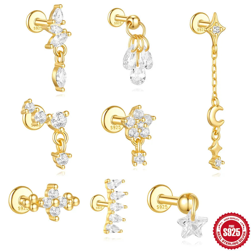 Geometric moon and star earrings in S925 sterling silver with embedded diamonds and a gold colour finish.