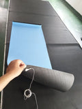 Blue conductive yoga mat with floral pattern and grounding wire for earthing exercises