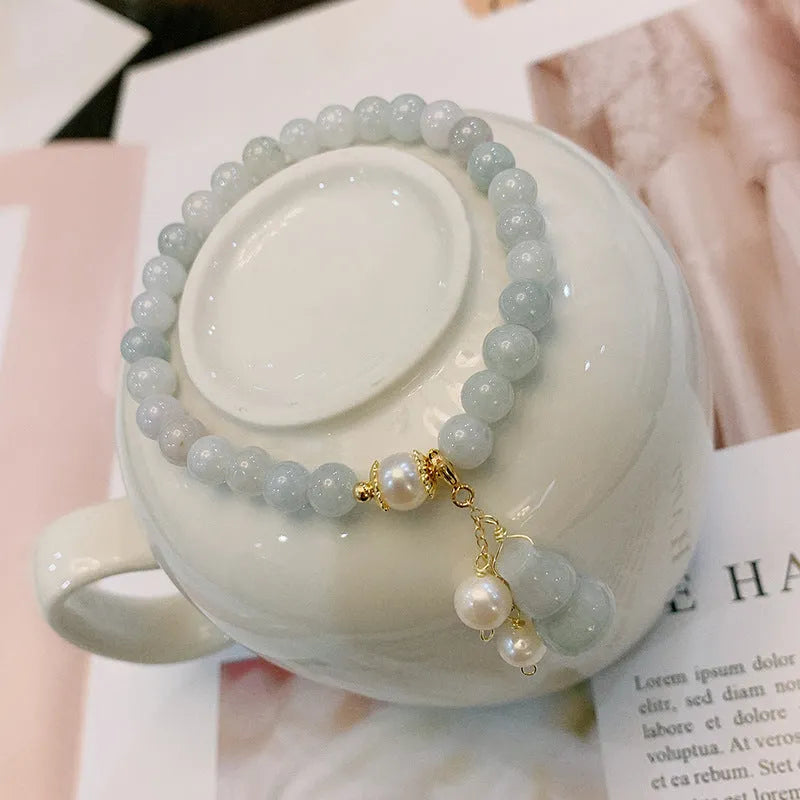 Handmade Chinese style jade bracelet with emerald colour, gourd design and pearl accents