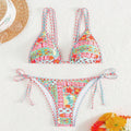 Women's lace-up front swimsuit with high-cut split leg design in polyester spandex fabric