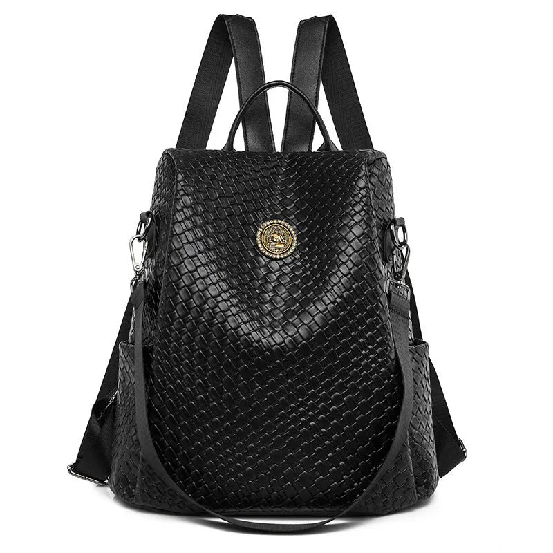 Women's black anti-theft backpack with woven details and multiple compartments