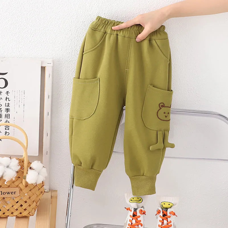 Boys' velvet sport pants in gray, green, and brown with elastic waistband and drawstring