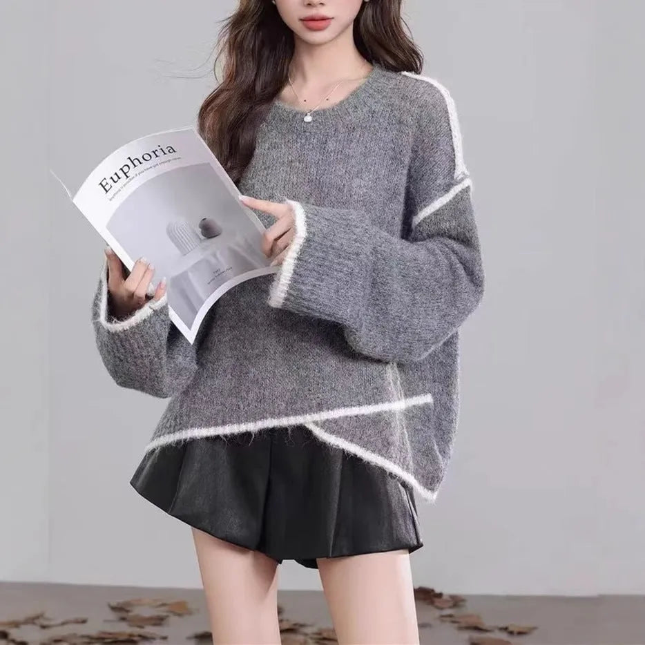 Women's idle style gray cotton loose pullover sweater on a plain background