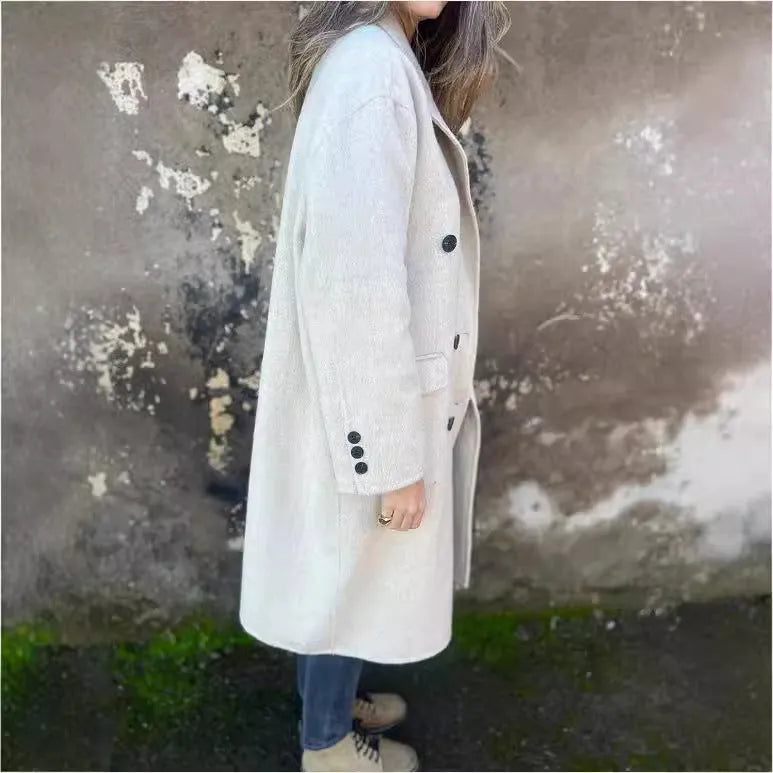 Women's mid-length lapel double-breasted long sleeve jacket in solid colour polyester, loose fit, front view