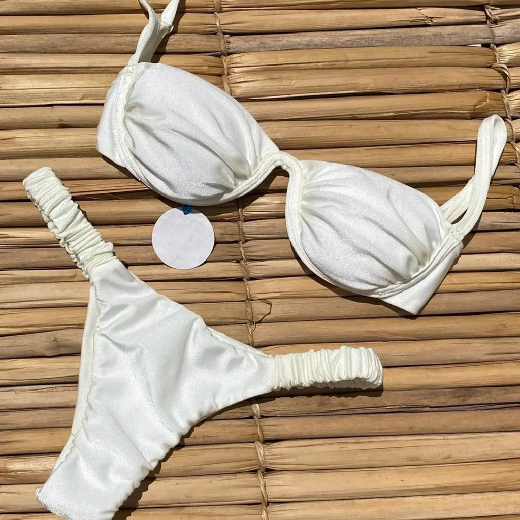 Women's khaki underwire bikini swimsuit with split bottom briefs on a mannequin.