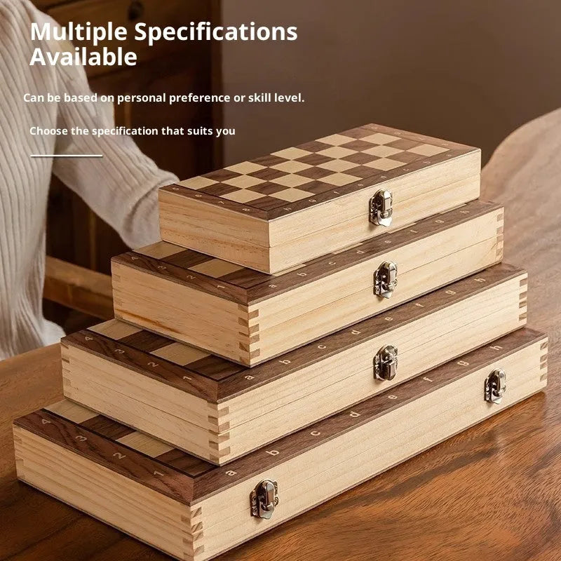 Walnut foldable solid wood children's chess set with brown board and pieces on wooden surface