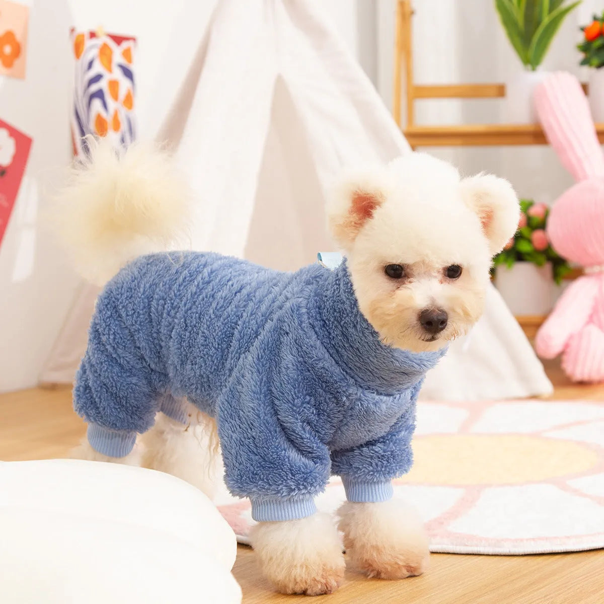 Four-legged thick plush dog clothing with high collar in blue colour showing full coverage design