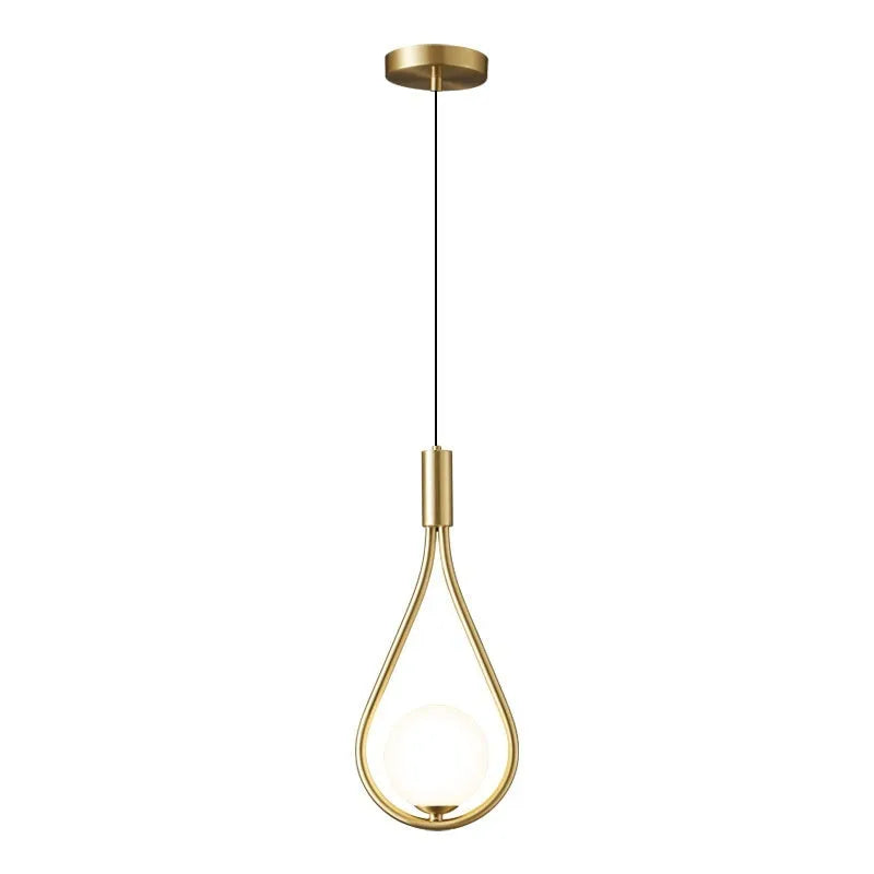 Modern copper bedside chandelier with adjustable hanging cord in minimalist bedroom setting