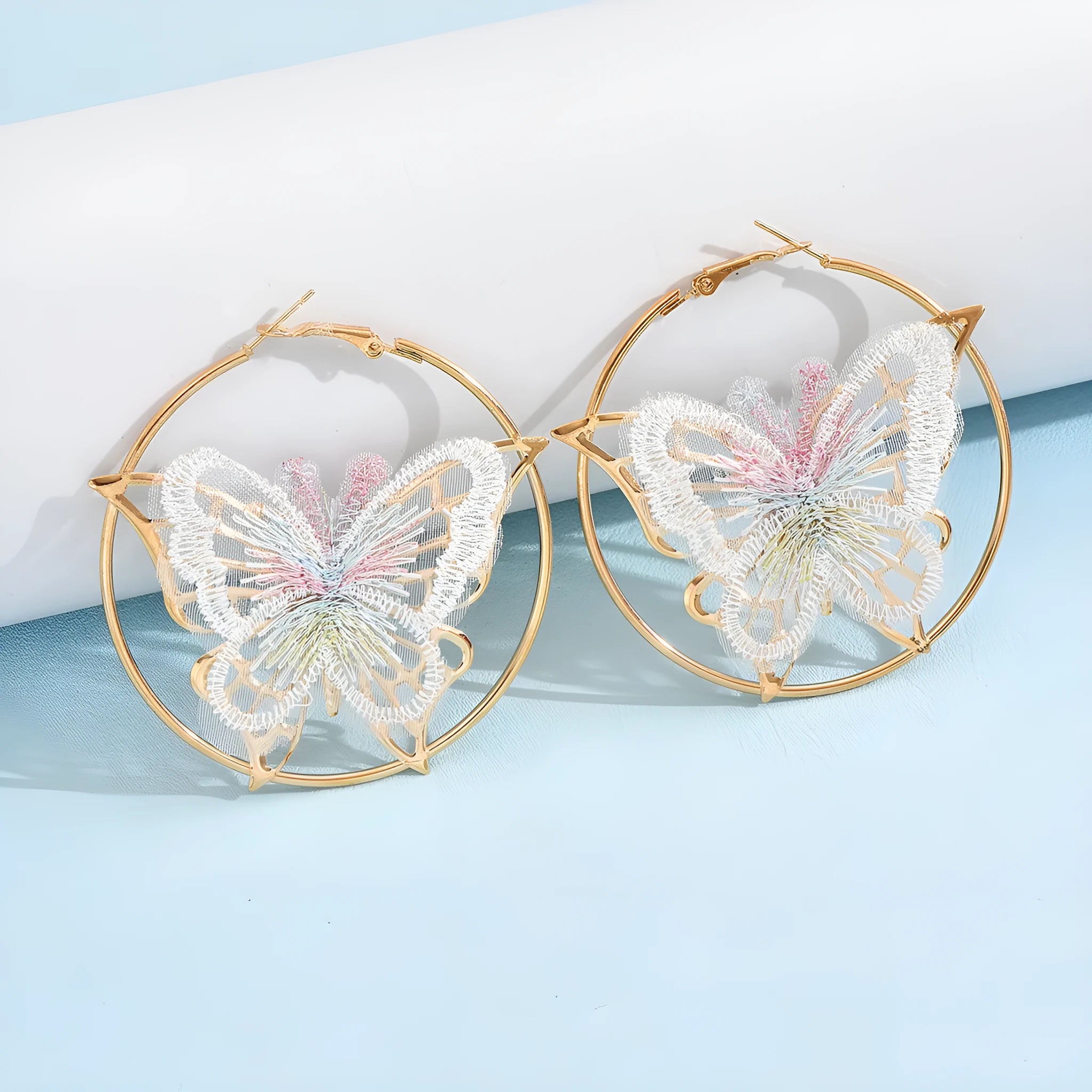 Gold butterfly clip-on earrings for women with geometric design and iron construction