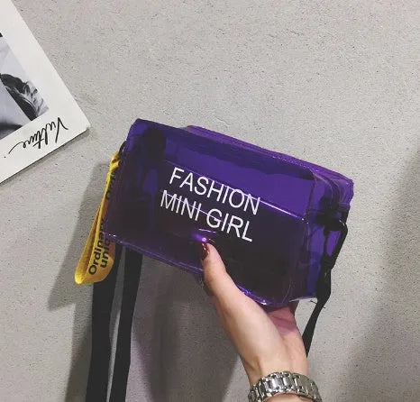 Transparent square jelly women's shoulder bag with an adjustable long strap, shown in multiple colours.
