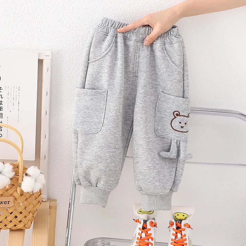 Boys' velvet sport pants in gray, green, and brown with elastic waistband and drawstring