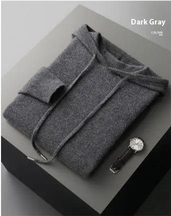 Men's dark grey cashmere hooded sweatshirt and matching long pants laid flat as a complete set.