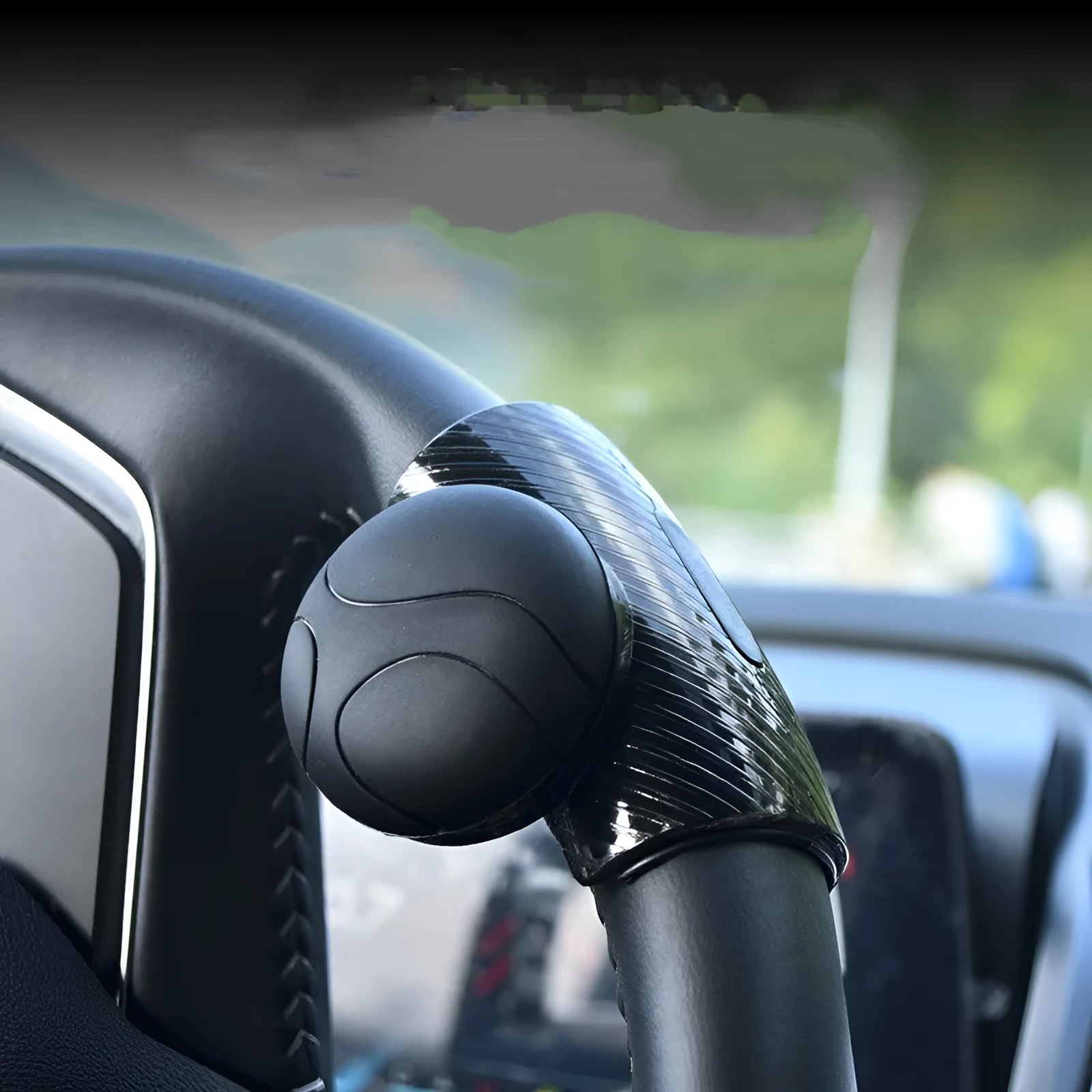 Black and blue steering wheel assist balls with silicone construction and metal bearing mechanism
