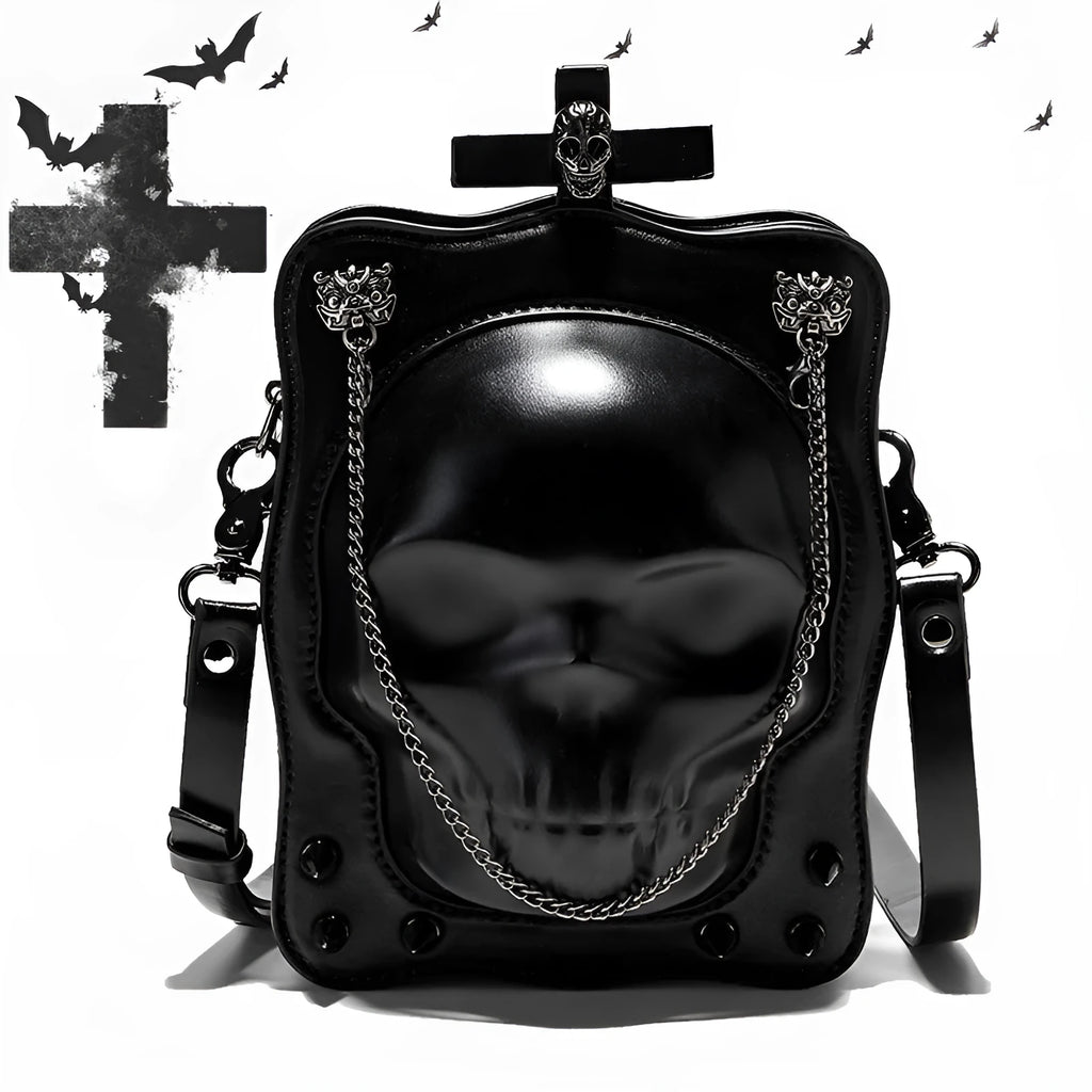 Black mini skull shoulder bag with 3D embossed design, chain strap, and vertical square shape for Gothic fashion.