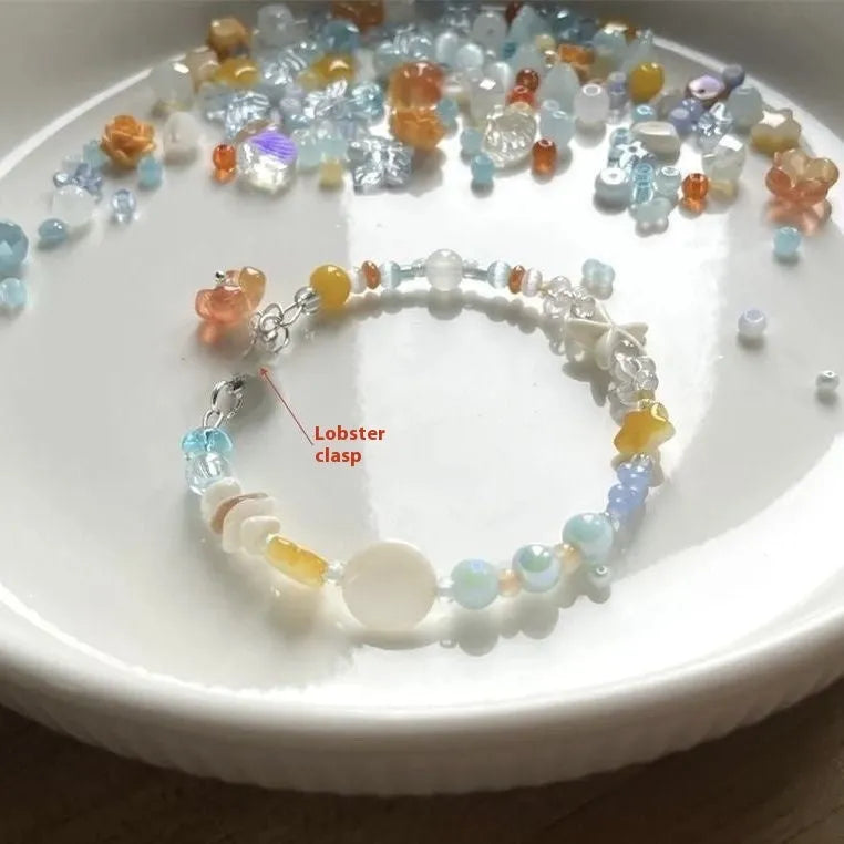 Orange mixed material diamond-shaped women's bracelet with round design elements