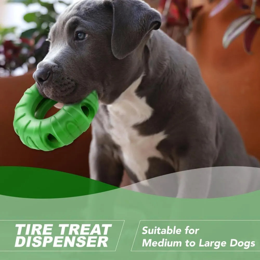 Blue tyre-shaped dog chew toy with oval openings for treat dispensing