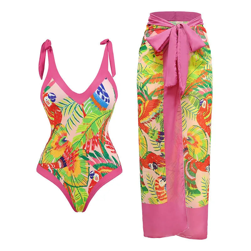 Women's pink floral print retro one-piece swimsuit with V-neck, covered belly and thin skirt