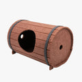 DIY assembled wine barrel shaped cat bed made from grey felt pieces with binding straps.